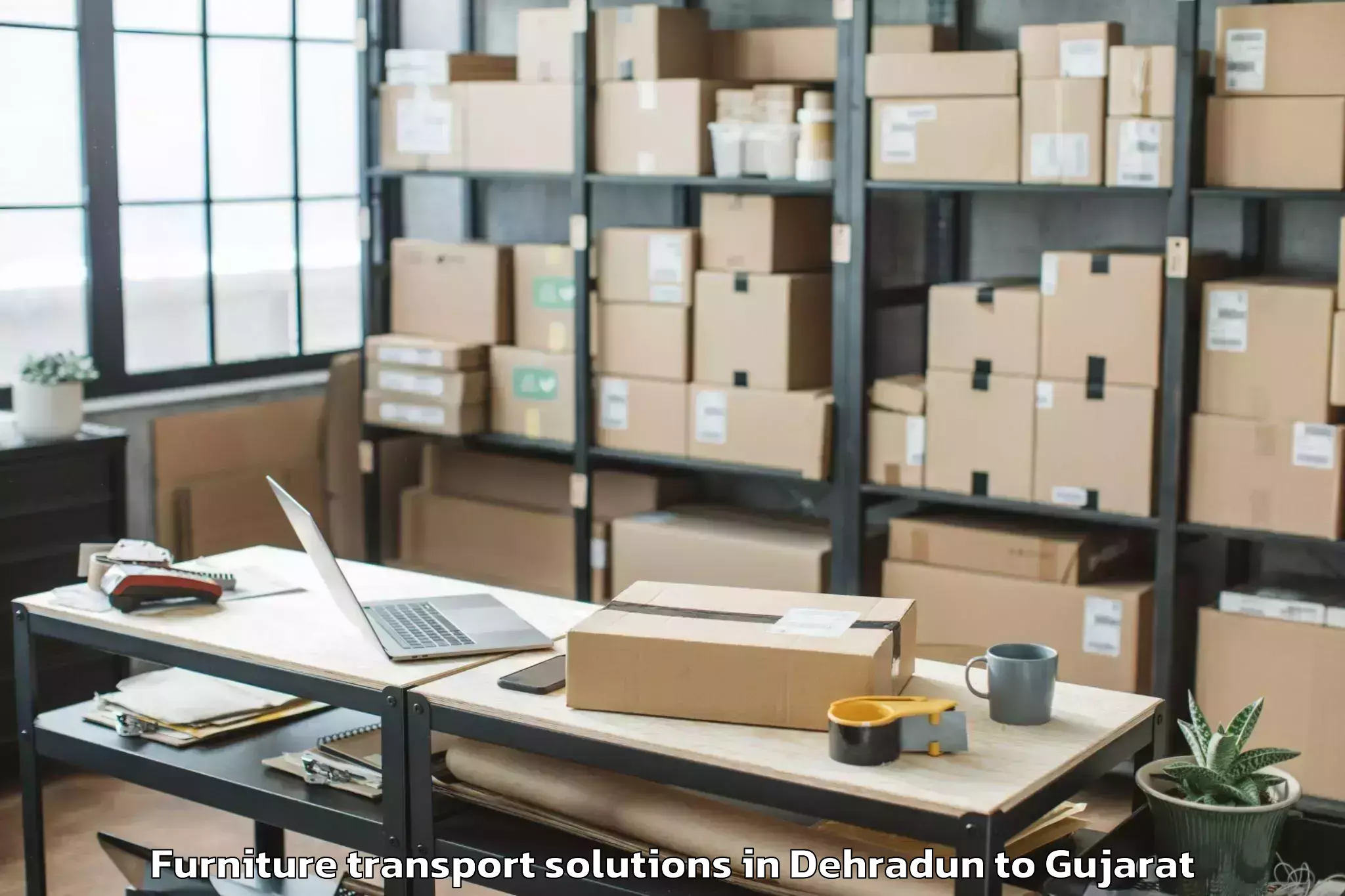 Top Dehradun to Kadodara Furniture Transport Solutions Available